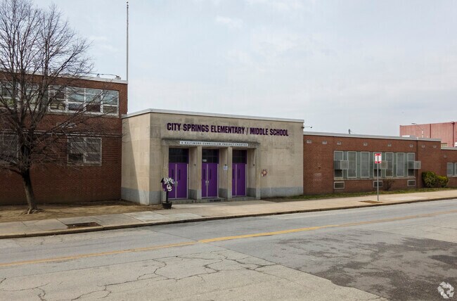 City Springs Elementary?Middle School near Little Italy has a great football field.