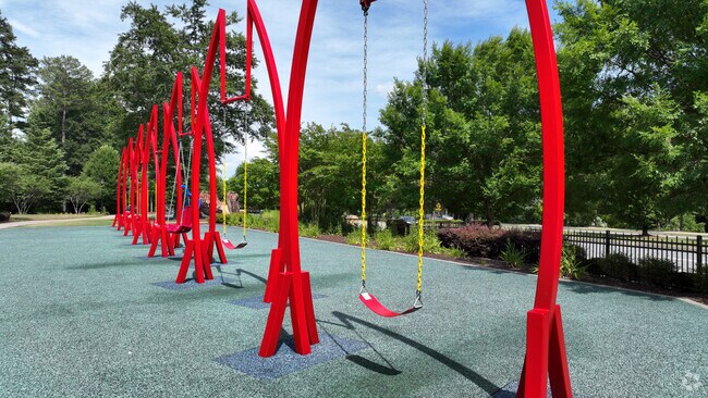 Children love the brightly colored playground at Abernathy Greenway Park.