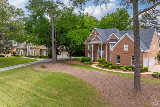 Homes in Seven Oaks are situated on spacious lots with mature trees and well-maintained yards, offering a quiet and established residential feel.