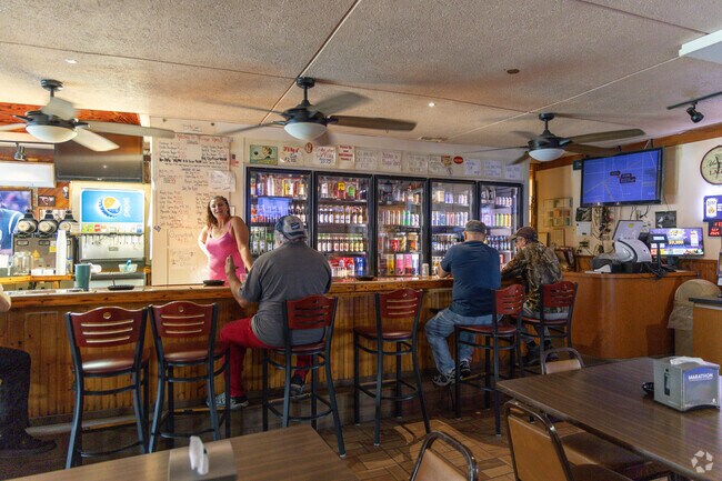 Mazloom’s Bar and Restaurant, famous for its burgers, offers a warm, welcoming vibe where locals gather to relax and chat.