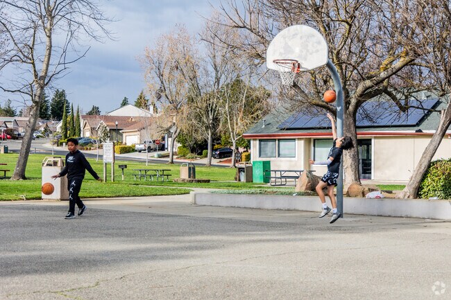It's common to see kids playing basketball in Foxboro park in Hercules.