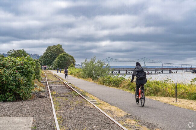 Residents enjoy cycling, jogging and walking on the paved Astoria Riverwalk.