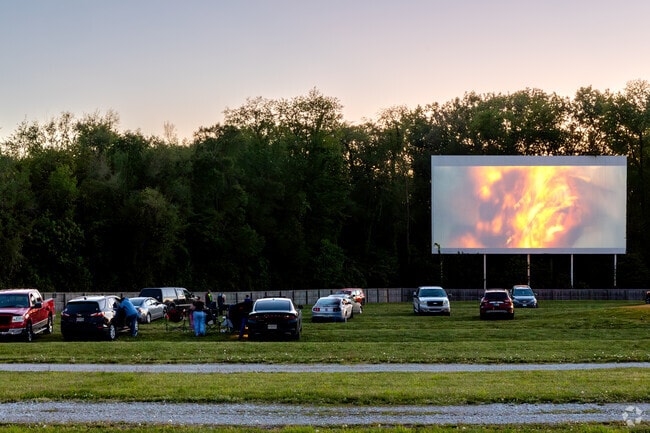Moviegoers enjoy a classic film at Moonlite Drive-In Movie Theater near Sheridan Park.