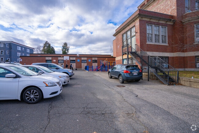 Students can shoot hoops in the parking lot behind Mary Lyon High School in Brighton.