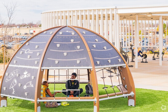 The park at The Village Library near Camelot Bel-Aire is a favorite spot for locals.