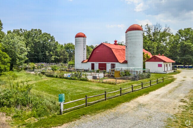 A community garden adds life next to the Grist Mill at Grist Mill Park in Mt. Vernon, VA.