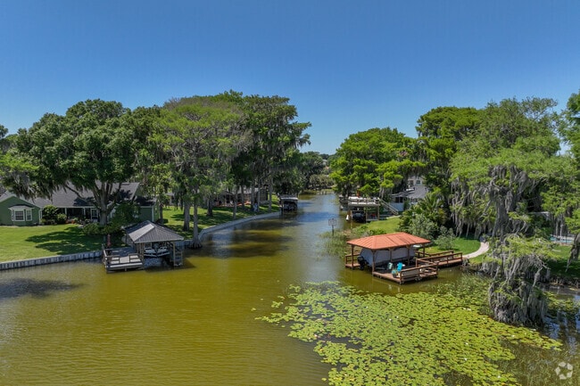 Homes on Lake Yale, in Grand Island, have cozy canals for backyard boat access.