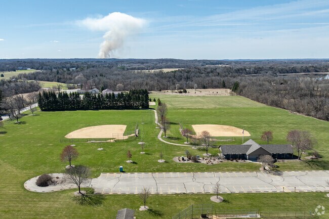 Summer in Ottawa means baseball action at the bustling Ottawa Town Park.