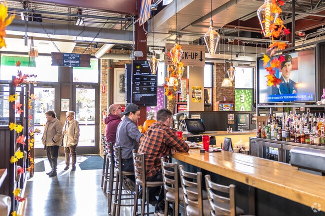 Pull up at the bar to enjoy a cold one with friends at D'Agostinos Pizza and Pub near Ransom Ridge.