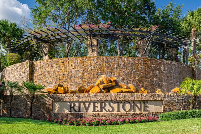 Riverstone welcomes residents with a large decorative fountain at the entrance.