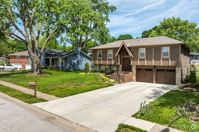 Raised ranches and sidewalks line the streets of Turner.