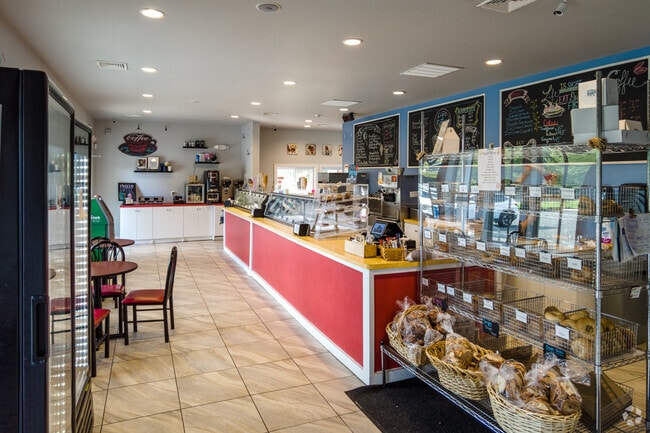 Treat yourself to a delious bagel or an icecream treat at Cups and Cones / All Star Bagel.