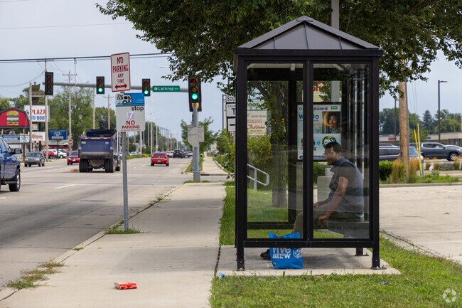 Public bus stops sit along major roadways.