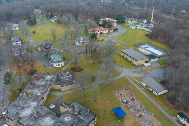 Edenwald School bas buildings for different departments.