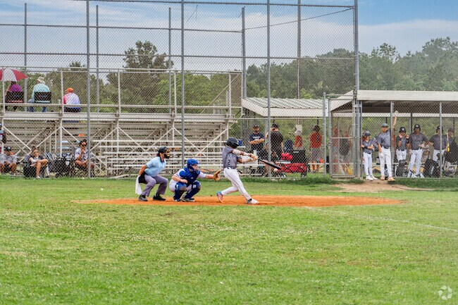Hitchcock residents can watch a game of Little League baseball at Jack Brooks Park.