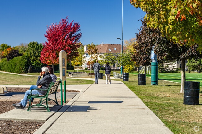 Enjoy the clear walking paths and park benches at Sunset Meadows in Fairivew.