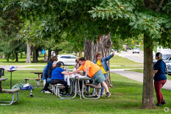 Residents of Falling Waters, Jackson, MI meet and relax in neighborhood parks.