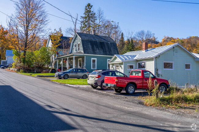 A row of homes in Websterville are close together and vary in styles.