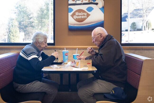 A couple enjoy the Dairy Queen Brazier in Hudson.