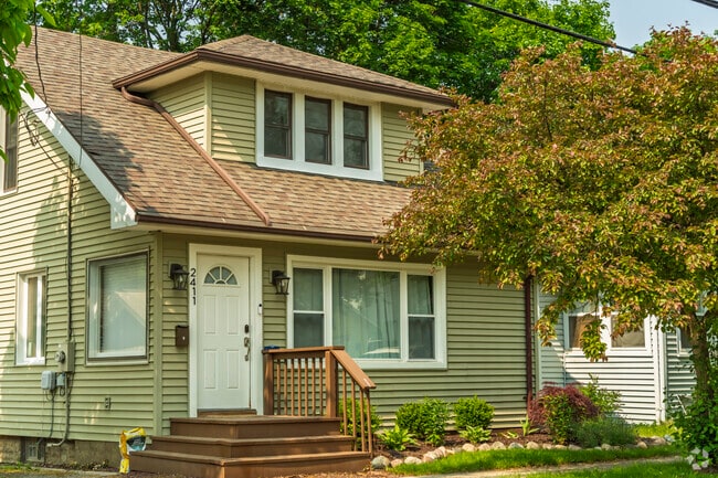 Cape Cod home with a tidy lawn in Foster.