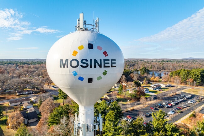 A landmark tower proudly displays the name Mosinee.
