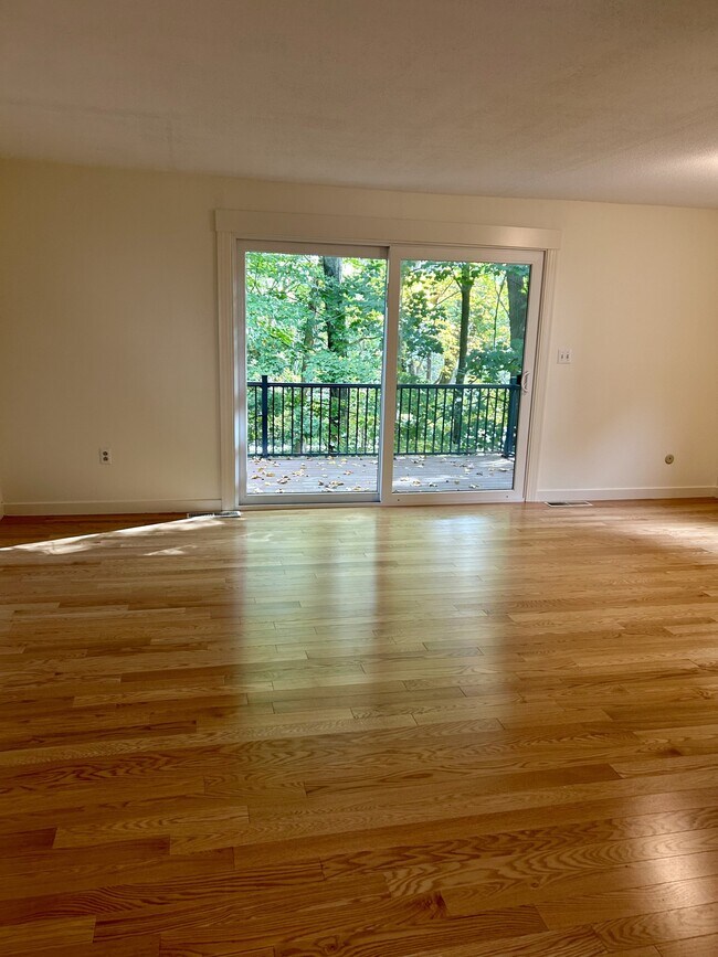 Living room w/ private deck