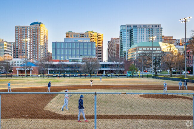 Breathtaking Ballston city skyline views from the lush fields of Quincy Park.