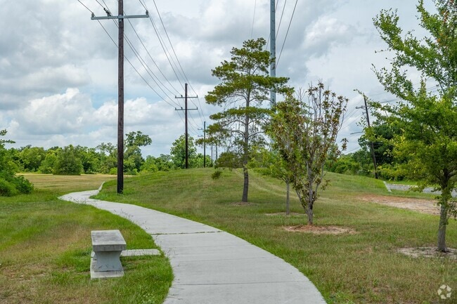 Plum Orchard has one walking trail lined with trees and a bench for locals to exercise on.