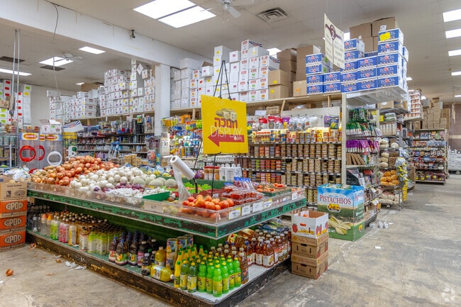 Fresh produce and essential home items can be found at New Square Supermarket.