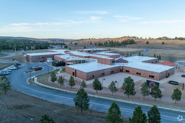 The front facade of Corral Drive Elementary School reflects community spirit in Rapid City.