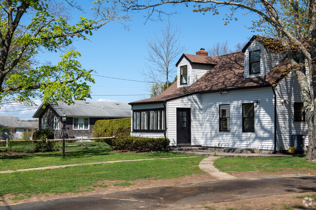 Homes in the Touisset Highlands neighborhood are clustered on a hillside overlooking the water.