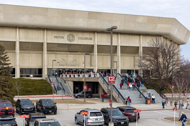 Edwards residents proudly cheer on the Cyclones at Hilton Coliseum.