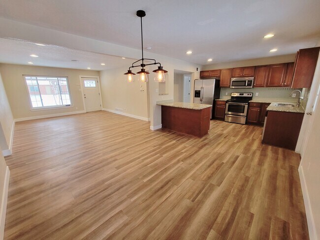 Open concept kitchen, living, dining