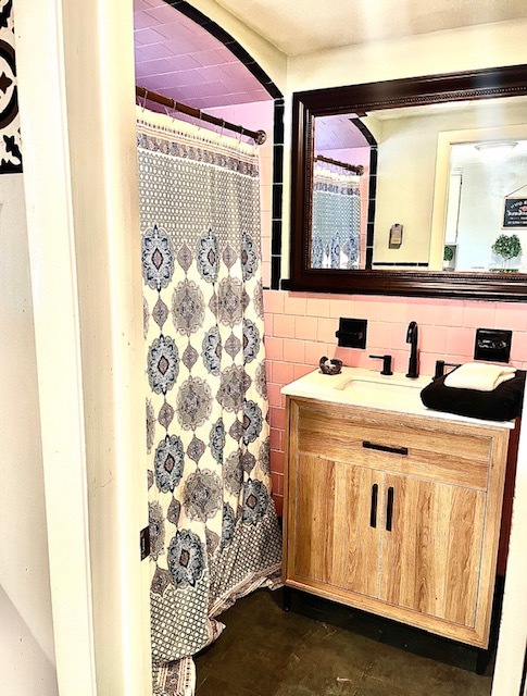 Bathroom with tub and shower