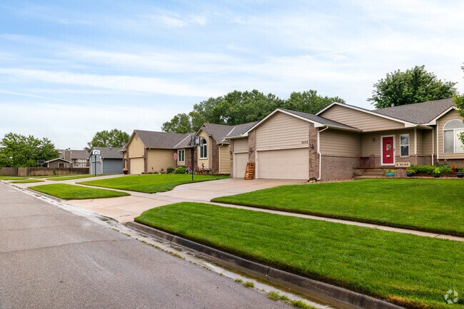 Many of the homes in Bradford-Sterling Farms have sidewalks running through the front yards.
