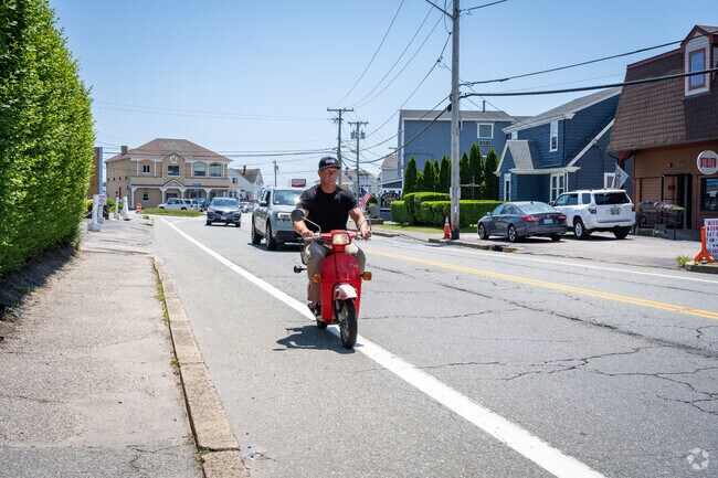 Locals enjoy cruising through the streets of Easton Pond to admire the scenic shores of Newport.