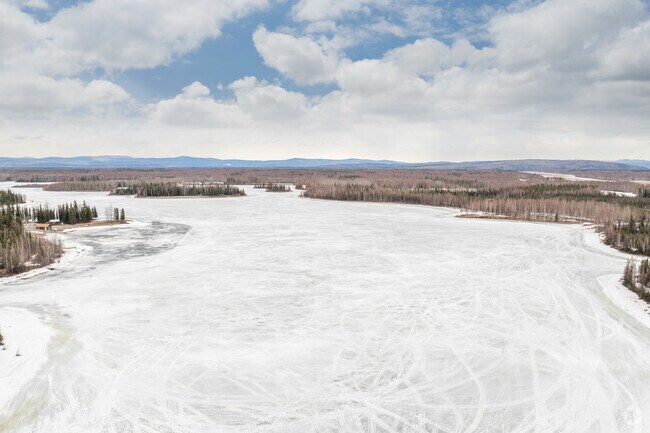 Ice-covered fields stretch out across Badger’s frozen winter landscape.