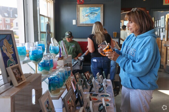 Vendors sell unique handcraft gifts  at Oyster Fest.