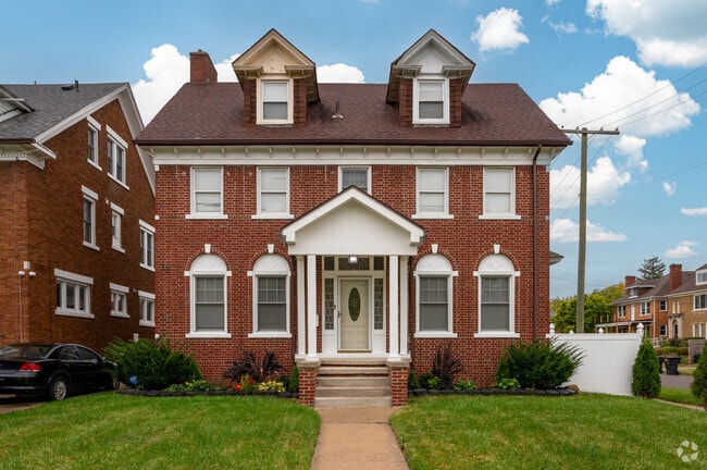 Stately Colonial homes with red brick exteriors are popular in the Virginia Park Community.