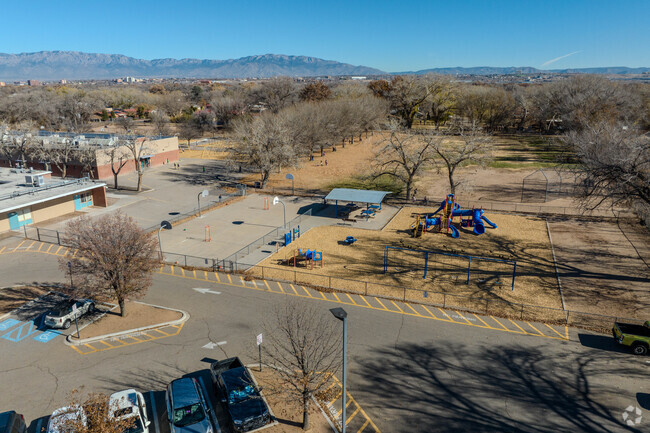 Basketball courts and the playground at Armijo Elementary School.