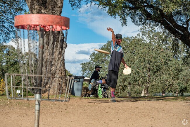 A disc golfer practices at Johnson-Springview Park.
