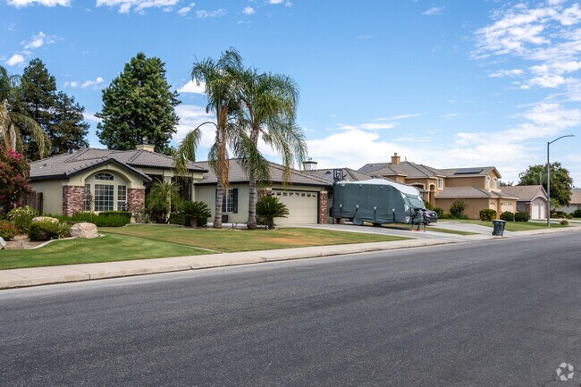 A charming row of tile-roofed homes nestled in the picturesque neighborhood of Terra Vista.