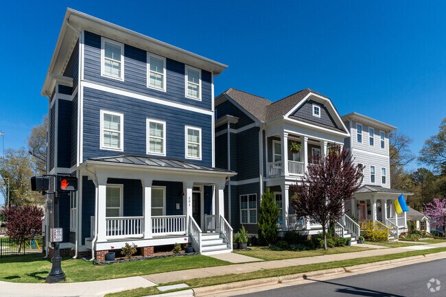 New homes line the streets of Downtown Cary near the park