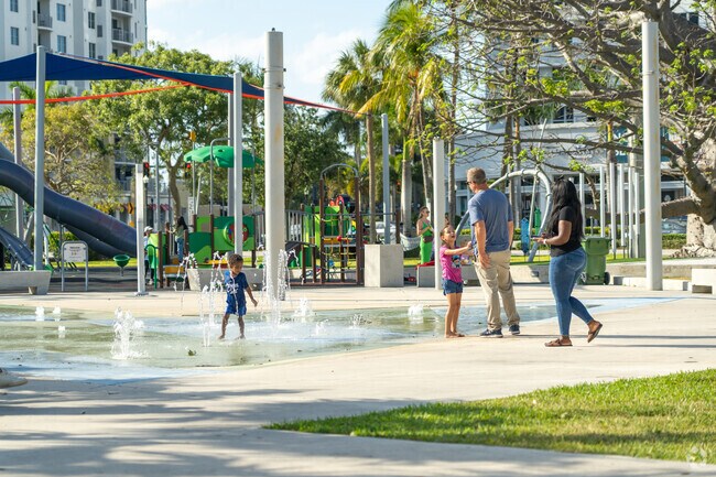 Splash around at the water park at ArtsPark at Young Circle.