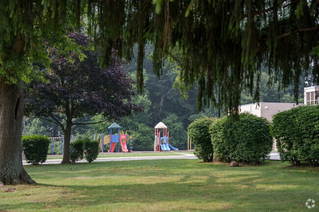 Worrall Elementary School's campus is characterized by mature, shady trees.