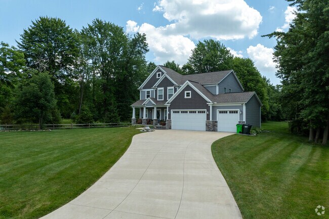 A newly built traditional-style home situated on a spacious lot in Munroe Falls.