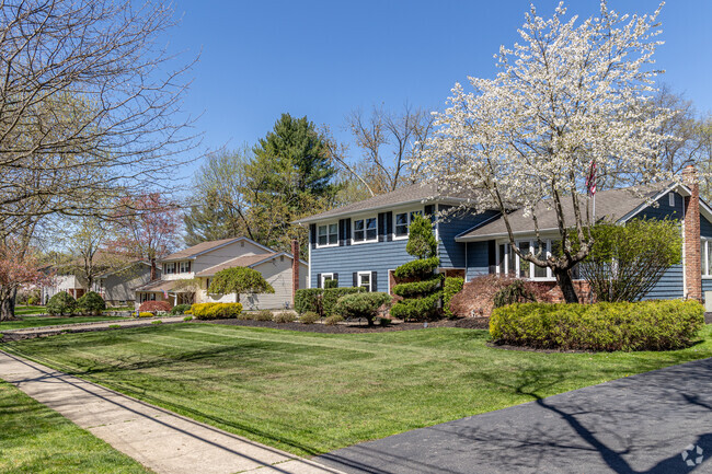 Pine Brook's picturesque streets are adorned with lovely homes.