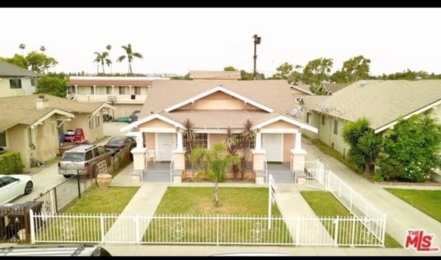 3937 Denker Ave unit 3937and one forth, Los Angeles, CA 90062 - photo 1
