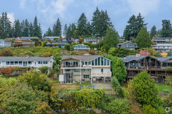 Hillside homes in West Lake Sammamish often feature decks with sweeping lake views.