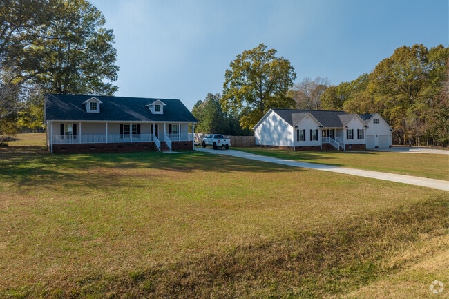 Homes with long drives and set back homes are more common just outside the center of town.